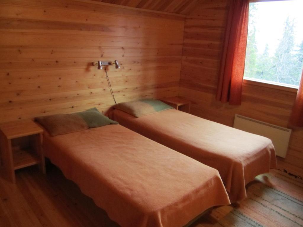 Rukajarven Kelopirtit Cottages Szoba fotó